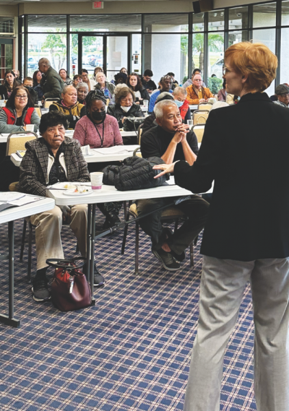 Newer gives her insight to an attentive audience.