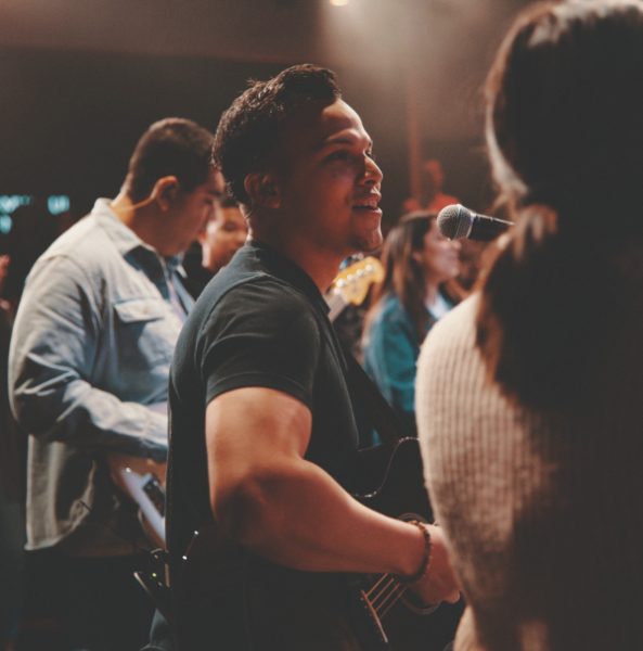 Jo Amaya worships in song.