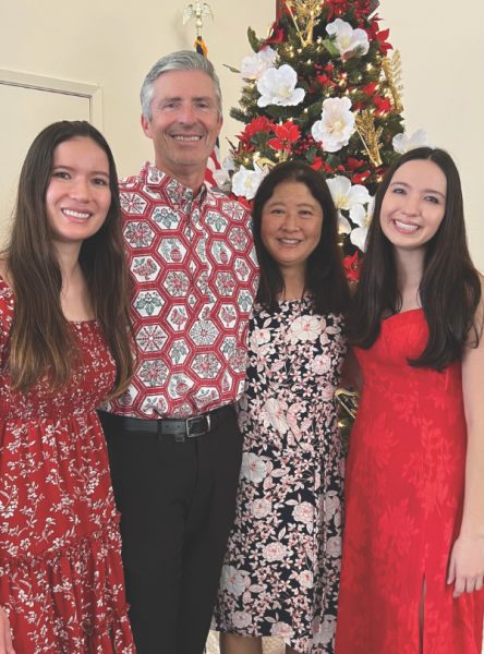 Geoffrey poses for a Christmas 2022 photo at the Aiea church with his wife and daughters. (Left to right) Katie, Geoffrey, Esther, and Elisabeth.