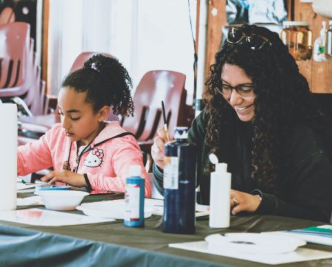 Attendees paint as a creative outlet.
