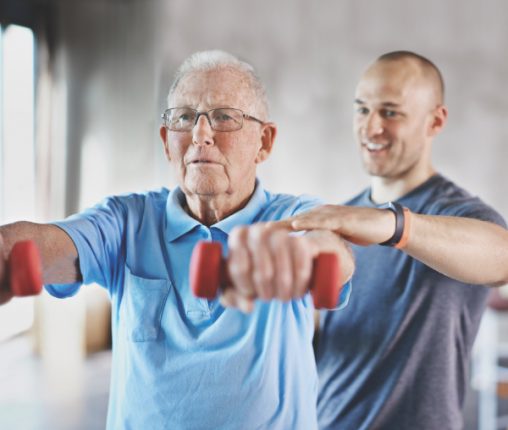Shot of a senior man working out with the help of a trainerhttp://195.154.178.81/DATA/i_collage/pi/shoots/784280.jpg