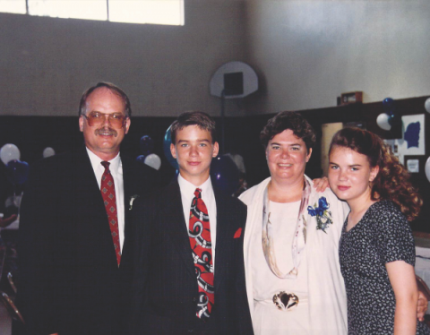 Fred Kinsey celebrates 8th grade graduation with son Jeff at Hilltop Christian School