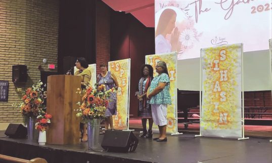 Organizers welcome attendees to the second annual The Gathering.