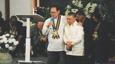 Vinh Nguyen, SCC Asian-Pacific Region director, offers the dedication prayer over the newly organized company.