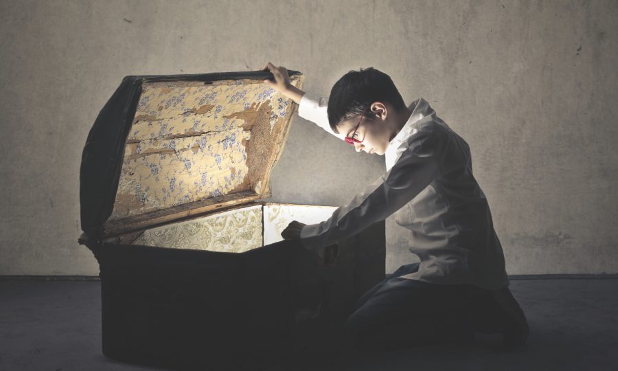Young boy finding treasure