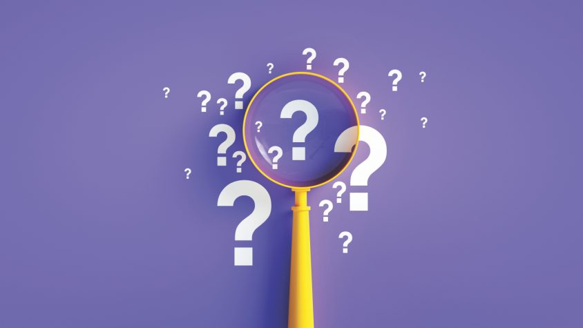 Magnifier And Question Mark On Purple Background