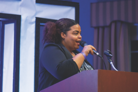Chanda Nunes, NUC executive secretary, welcomes participants to the English breakout session.