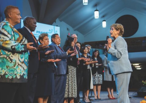Karen Martell blesses officers and their spouses.