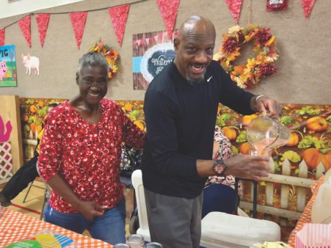 Brenda Goodwin and son, Earl, run the drink booth.