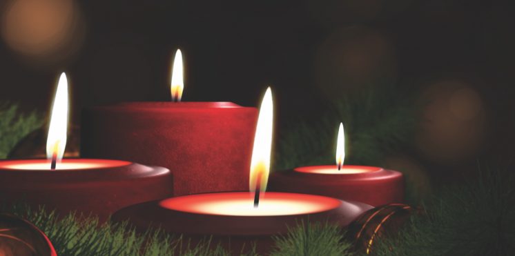 Romantic festive Christmas holiday evening. Four lit red candles on indoor Advent wreath. Romantic festive candlelight with tranquil bokeh lights and dark copy space. 3D illustration Xmas background.