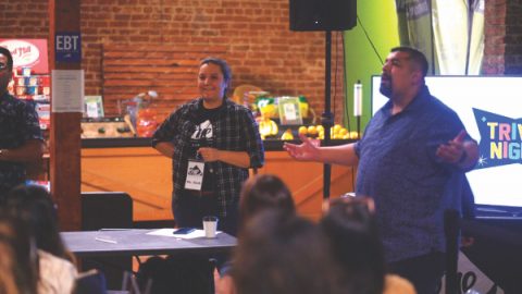 Sarah Grover (left), associate pastor at Camarillo church, and Isaac Nevarez (right), pastor at Canoga Park Community church, hosted the trivia games.