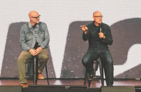 Michael Knecht (right) and Tim Gillespie discuss Crosswalk's three core values.
