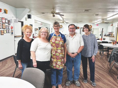 From left to right: Ann Dahl, Patty Hobson, Lee Harden, Gene Hobson, and Vickie Smith volunteer to help make Dining with a Doc a successful community event.