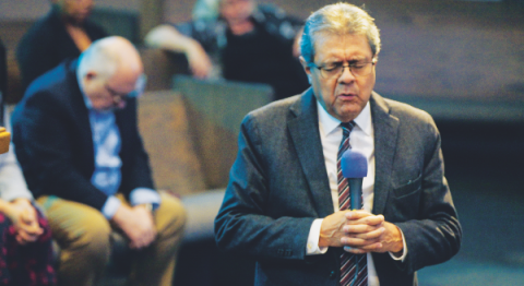 SCC President Velino A. Salazar prays at the event.