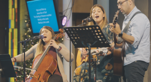 The praise team leads a powerful time of worship in song.