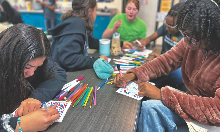 <p>Students make Valentine’s cards and messages for residents of a local skilled nursing and rehabilitation center.</p><p>Los estudiantes hacen tarjetas de San Valentin con mensajes para los residentes del centro de rehabilitación.</p>