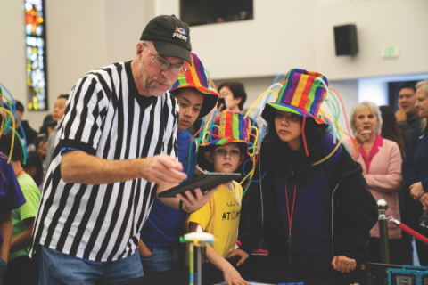 Valley Atoms, Antelope Valley Adventist School’s robotics team, await results calculated during the competition.