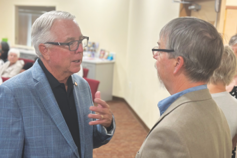 Craig McFarland, Casa Grande mayor (left), talks with Greg Fortney, Casa Grande church head elder.