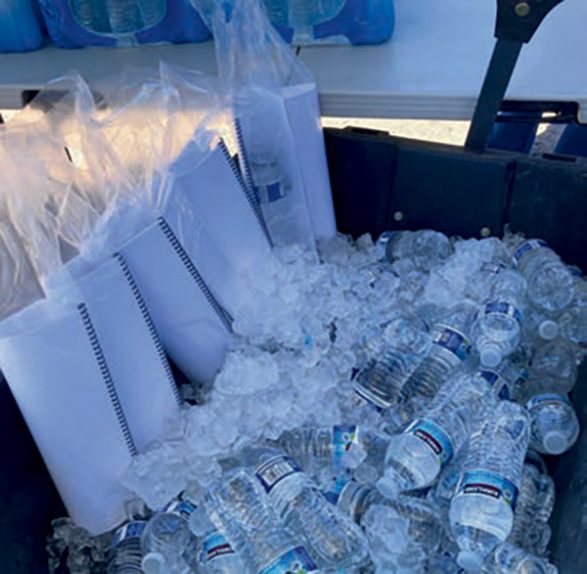 A “Gems for the Desert Nomad” book was included in a bag with a chilled water bottle to hand out to attendees to the Saguaro Man event.