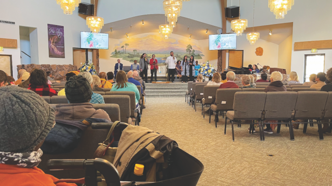 The Solid Foundation praise team leads the worship service during the grand reopening of the Sparks church.