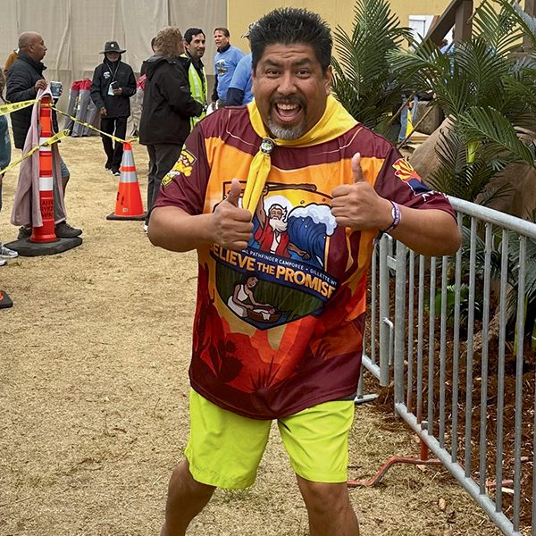 Arizona Conference Youth Ministries Director Manny Cruz gets ready to baptize Arizona Pathfinders.