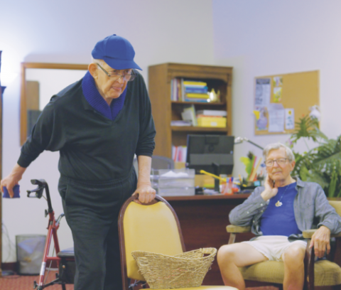 <p>Residents enjoy friendly competition during a fun game of beanbag baseball.</p><p>Los residentes disfrutan de una competencia amistosa durante un divertido juego de béisbol de pufs.</p>