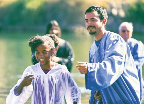 Brodkin smiles joyfully after her baptism.