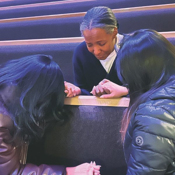 Attendees pray together in small groups for the Las Vegas Valley.