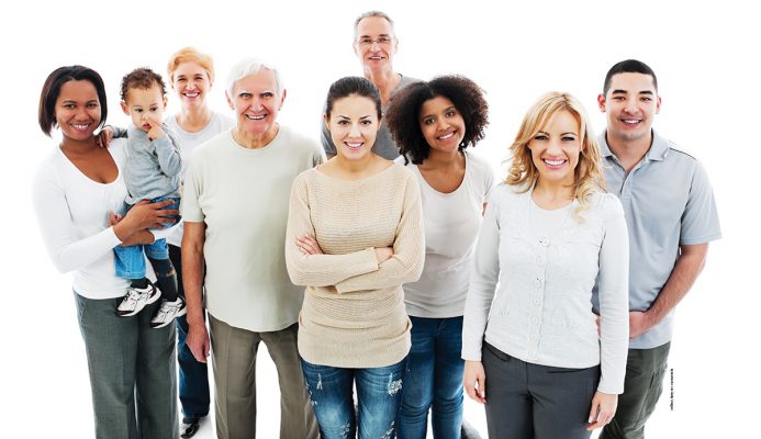 Group of Happy Multi-generation Family smiling and standing together.