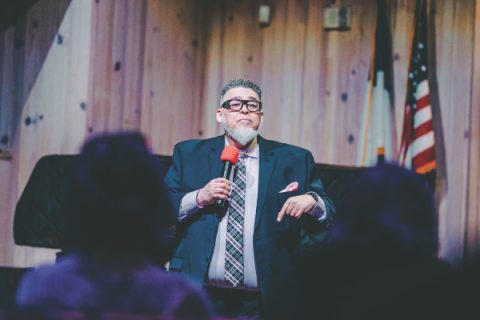 Carlos Camacho, NUC president, leads out as attendees pray together in small groups for the Las Vegas Valley.