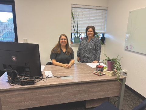 Principal Chandra Young (left) and lower-grade teacher Teresa Greene (right) in Young’s newly remodeled office.