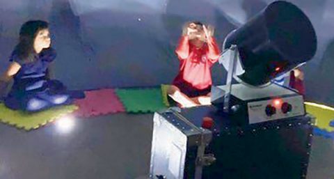 Students from TCE and area schools sat on mats around the outer edge of the STARLAB as they learned about the stars and solar system and experienced the majesty God’s universe.