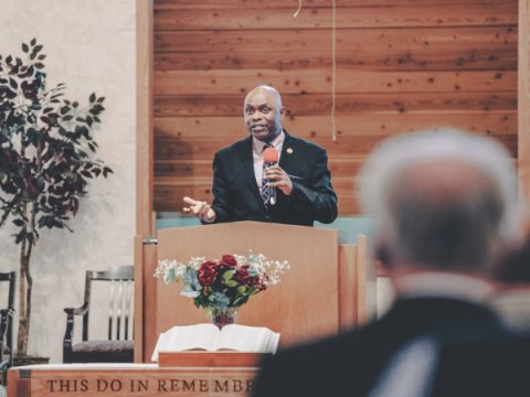 Pastor Oneil Madden, of Salt Lake City Central church, reminds attendees that true unity and transformation come only through the power of the Holy Spirit.