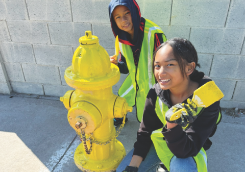 Taking a quick break from painting the fire hydrant to capture the moment.