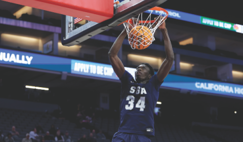 SGA sophomore Mahamadou Diop scores a dunk in the winning game to take the CIF Division III state champions title.