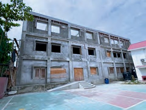 The exterior of the school prior to the project’s start.<br /> 
