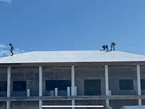 The completed roof now allows the school’s staff to have full
use of the building for classrooms.