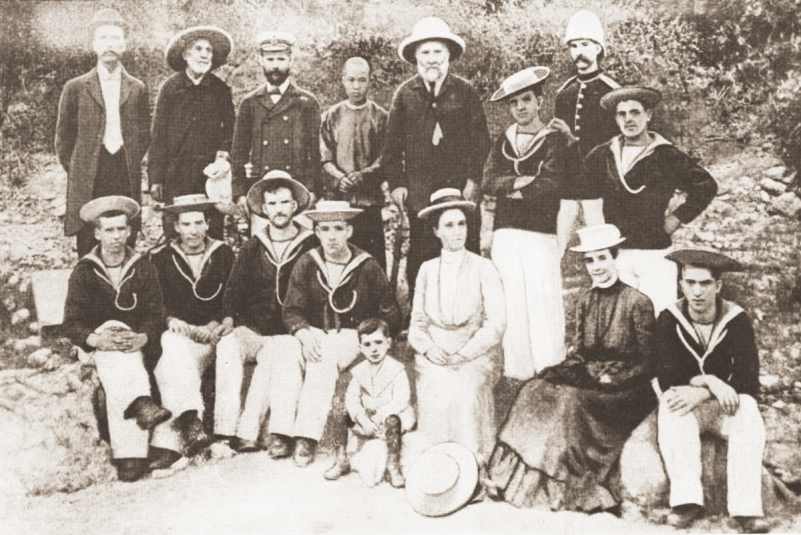 A group of interested British sailors and a soldier, Hong Kong, March 1902; Abram La Rue is standing in the back row holding a pitcher.