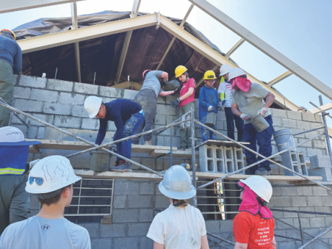 CAES students overcame physically demanding tasks on the jobsite and reached their construction goal in just four days.