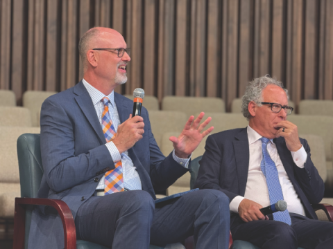 John Stanton (left) addresses a question during the panel discussion.