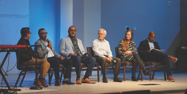 Penick asks a question of the panel of pastors.