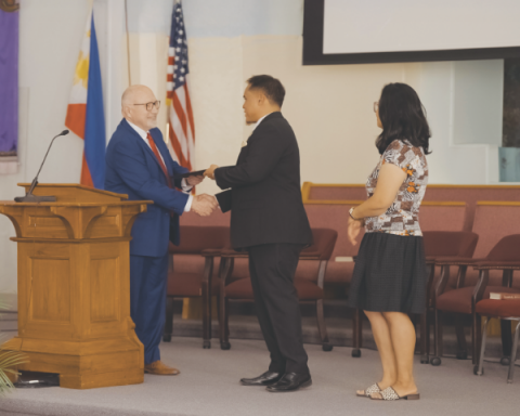 SCC President John H. Cress provides a framed copy of the congratulatory letter to GFC from SCC leadership. (Photos: Lauren Lacson)