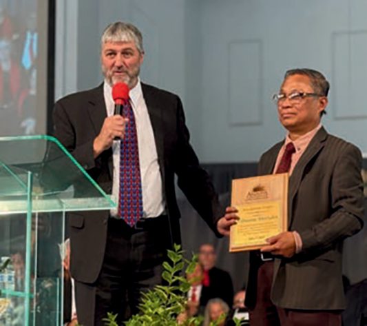 Ed Keyes recognized Villamor Meriales during the divine worship service at Camp Meeting.