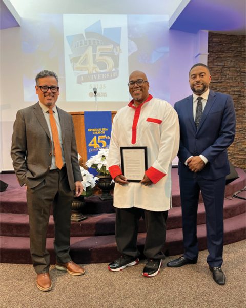 SCC Executive Secretary Danny Chan, Childs, and SCC GLAR Director Lawrence Dorsey II display a letter presented by SCC commemorating the occasion. (PHOTO: ALLISON WAITE)