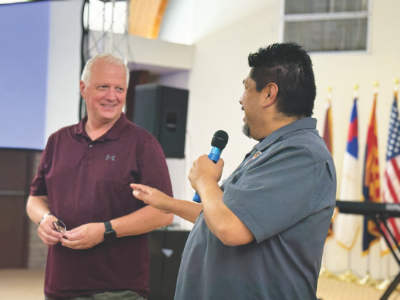Youth Director Manny Cruz (right) introduces Randy Hill, Pacific Union Vice President for Youth Ministries, as one of the seminar presenters at the leadership training.