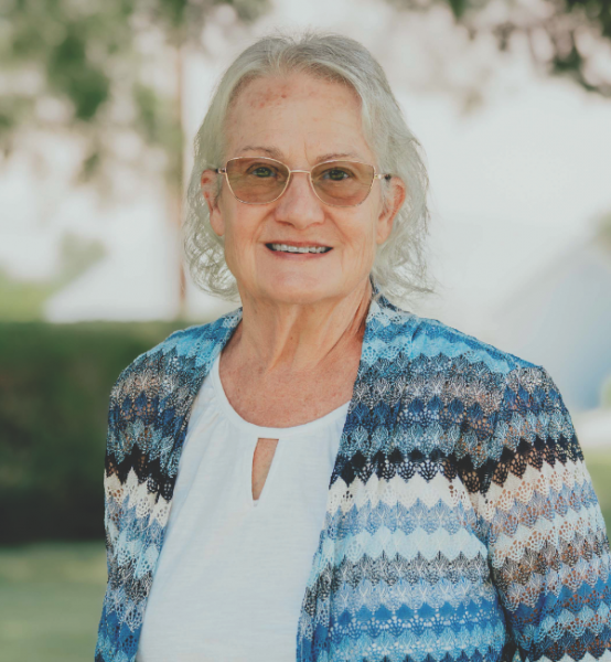 Sandy, after a Sabbath potluck in the summer of 2025, outside the Winnemucca church.