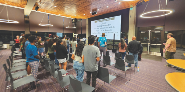 Students lift their voices in worship during a powerful evening session focused on keeping Jesus at the center.