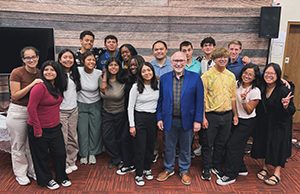 John H. Cress, SCC president, encourages the youth rush team with a devotional message.