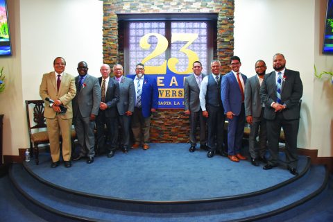 Current and former pastors of the Reno-Sparks Hispanic church during the celebration of the burning of the mortgage. Elders Brown and Camacho, as well as other conference pastors were present during the celebration.