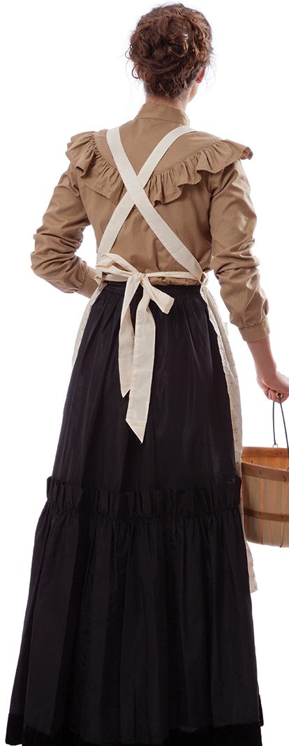 Young prairie woman holding a basket walking away isolated on white